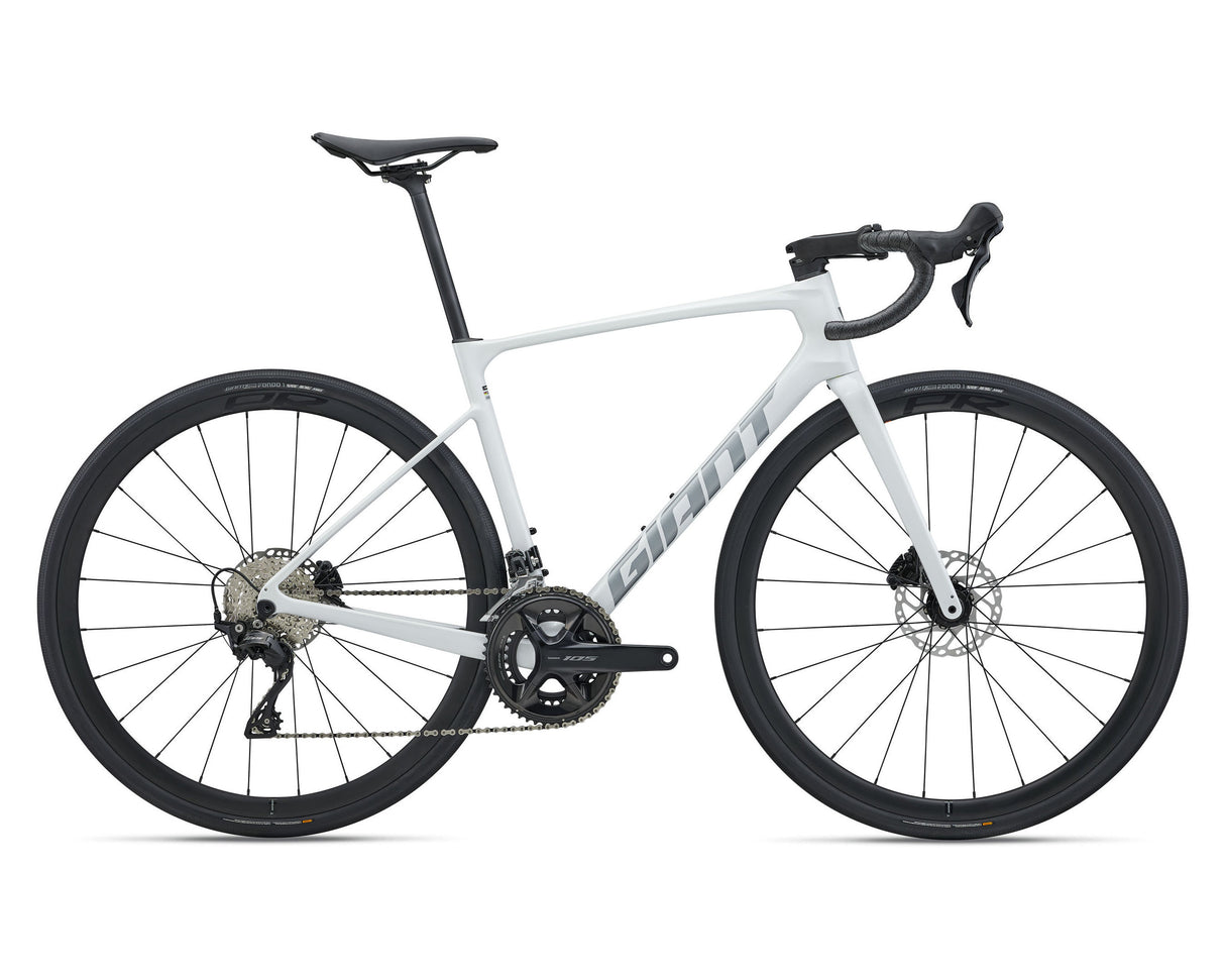 A white Giant road bicycle with black components, including the wheels, saddle, handlebars, and drivetrain, shown from a side profile on a white background.