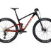 A red and black Giant Anthem Advanced 29 mountain bike with a rear suspension and dual chainrings.