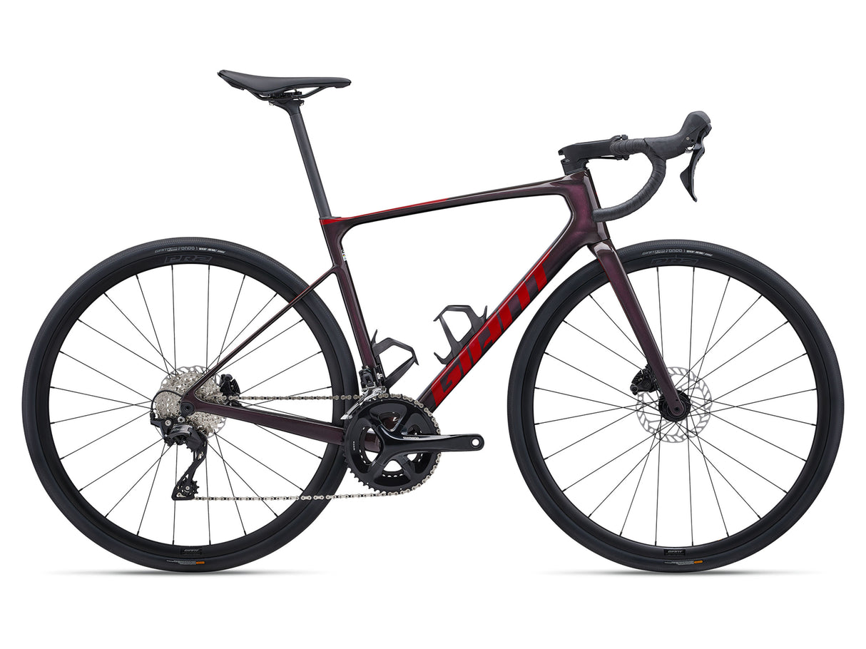 Giant Defy Advanced 2 (2024) mens carbon road bike in Tiger Red.