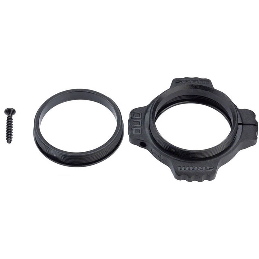 A black bottom bracket part preload adjuster kit for SRAM DUB bike cranks, including a ring and a screw.