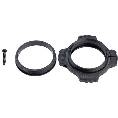 A black bottom bracket part preload adjuster kit for SRAM DUB bike cranks, including a ring and a screw.