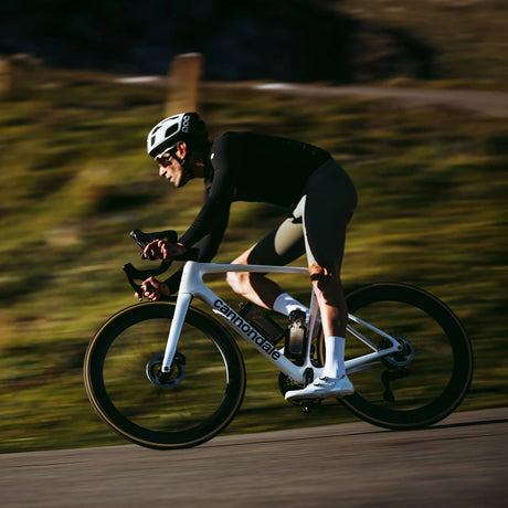 Racer descending on a Cannondale SuperSix EVO road bike