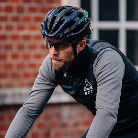 Cyclist wearing Magicshine Windbreaker glasses