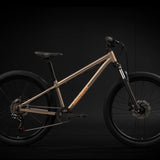 Norco Storm Youth 24 (2025) in Nanaimo Brown 24-inch kids mountain bike side view