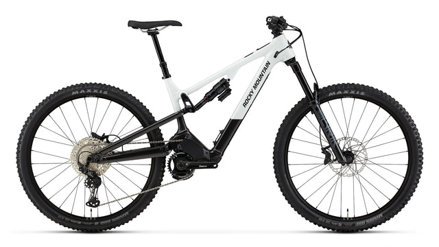 2026 Rocky Mountain Instinct Powerplay SL Alloy 50 FORM alloy electric mountain bike, drive side, showing Dyname S4 Lite motor and idler pulley